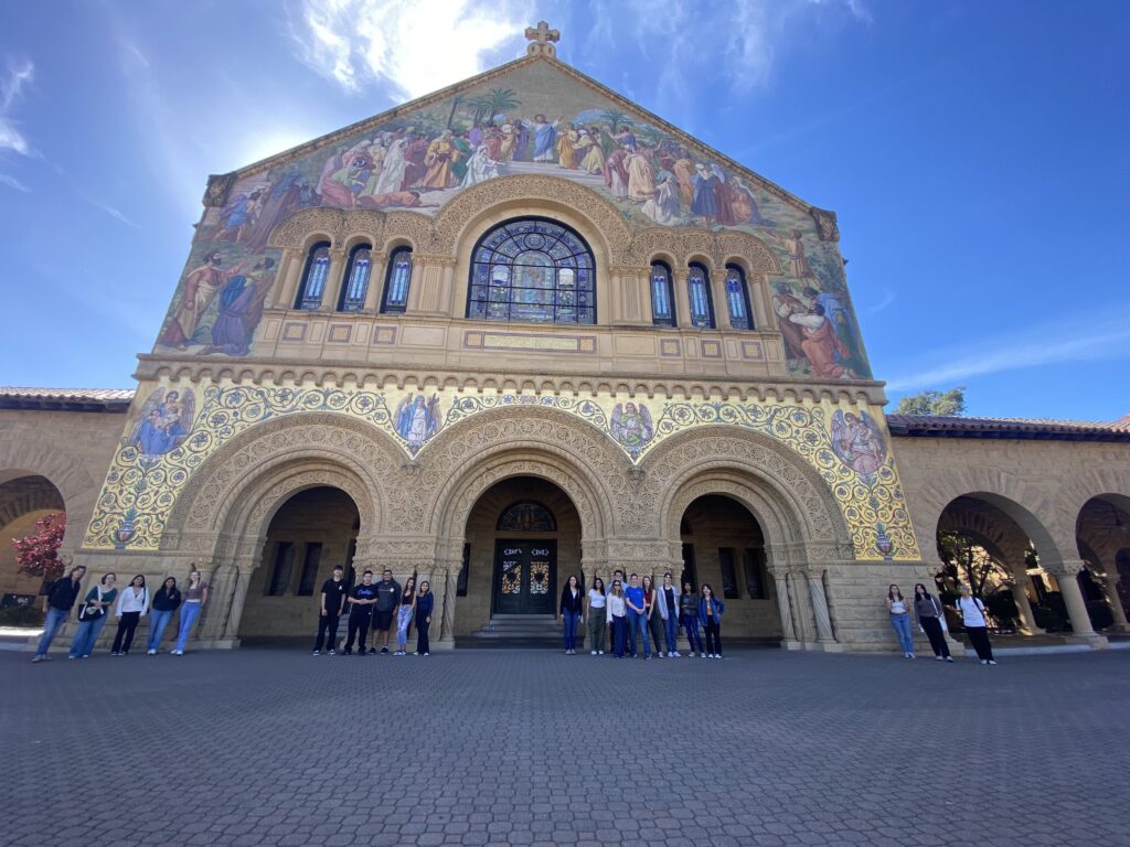 DIG CAMP students stand outside Stanford Memorial Church at Stanford University